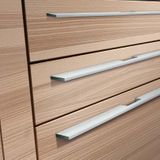 kitchen-drawers-fitted-with-long-profile-handles-in-stainless-steel-fi